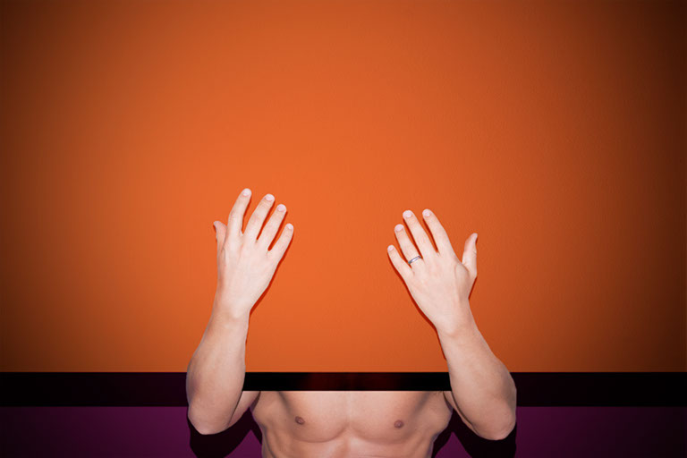 Felix Ossa - Domestic - Image of a man’s face behind a wall